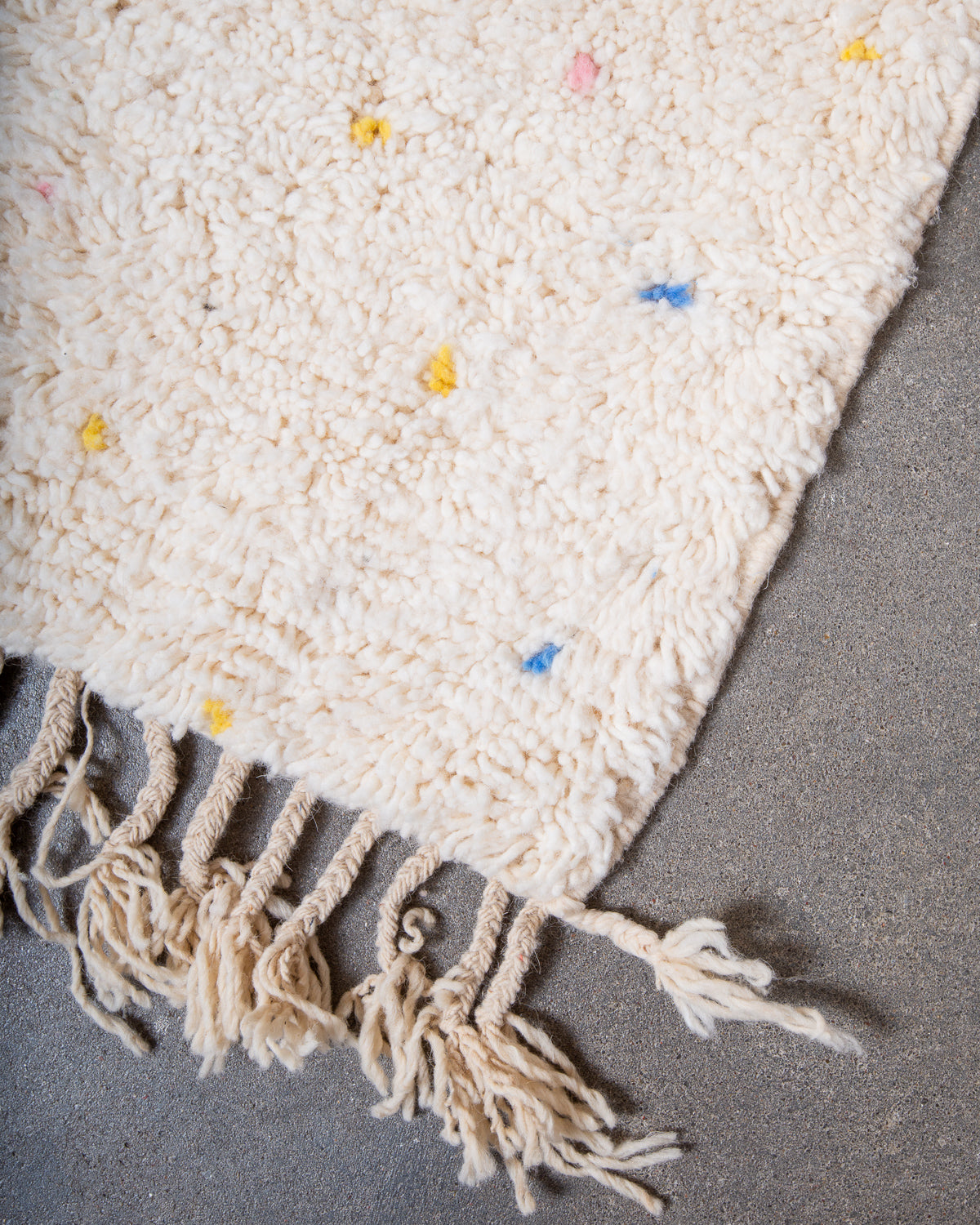 Modern, designer, handcrafted Berber rug from Morocco. Beniourain carpet with beautiful colours and patterns and fluffy wool texture.